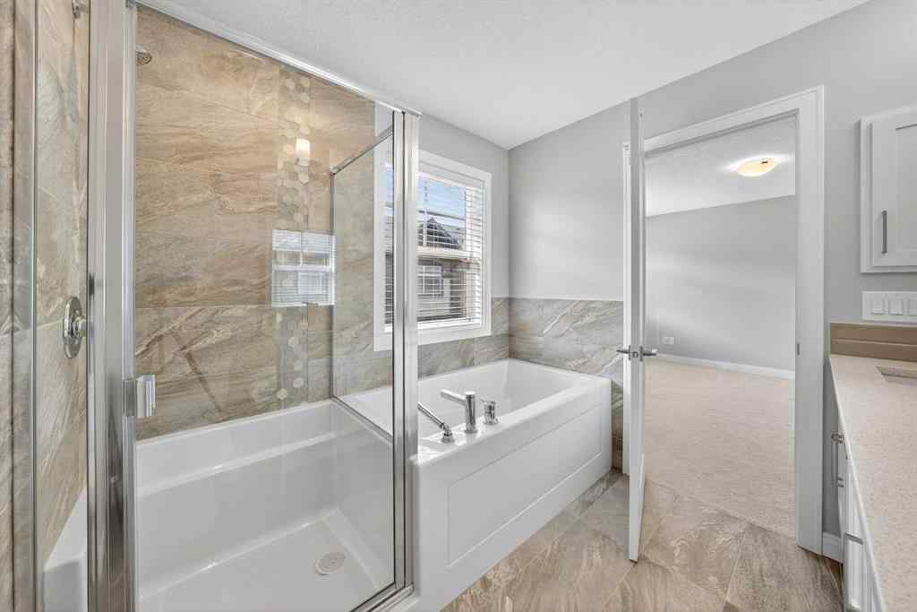 MLS® A2253921 - 405 Wentworth Row SW in West Springs Calgary, Residential