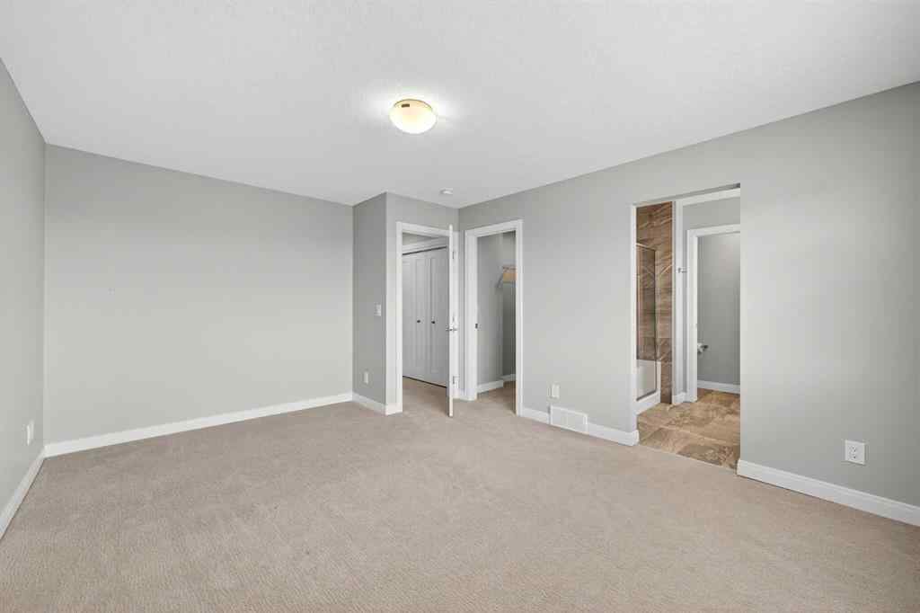 MLS® A2253921 - 405 Wentworth Row SW in West Springs Calgary, Residential