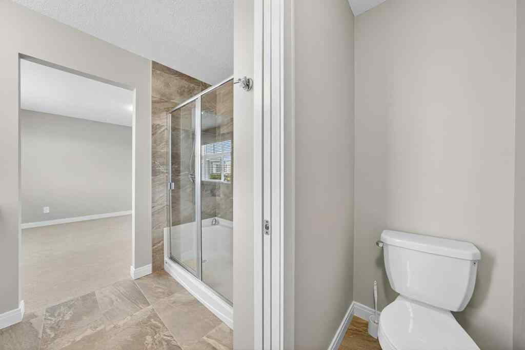 MLS® A2253921 - 405 Wentworth Row SW in West Springs Calgary, Residential
