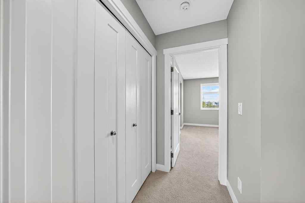 MLS® A2253921 - 405 Wentworth Row SW in West Springs Calgary, Residential