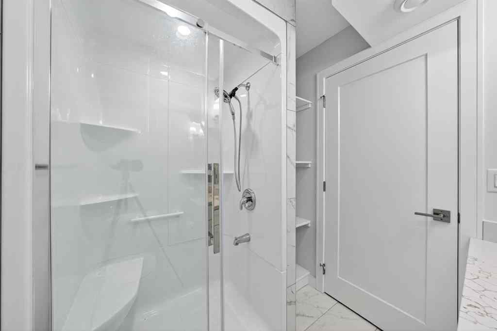 MLS® A2253921 - 405 Wentworth Row SW in West Springs Calgary, Residential