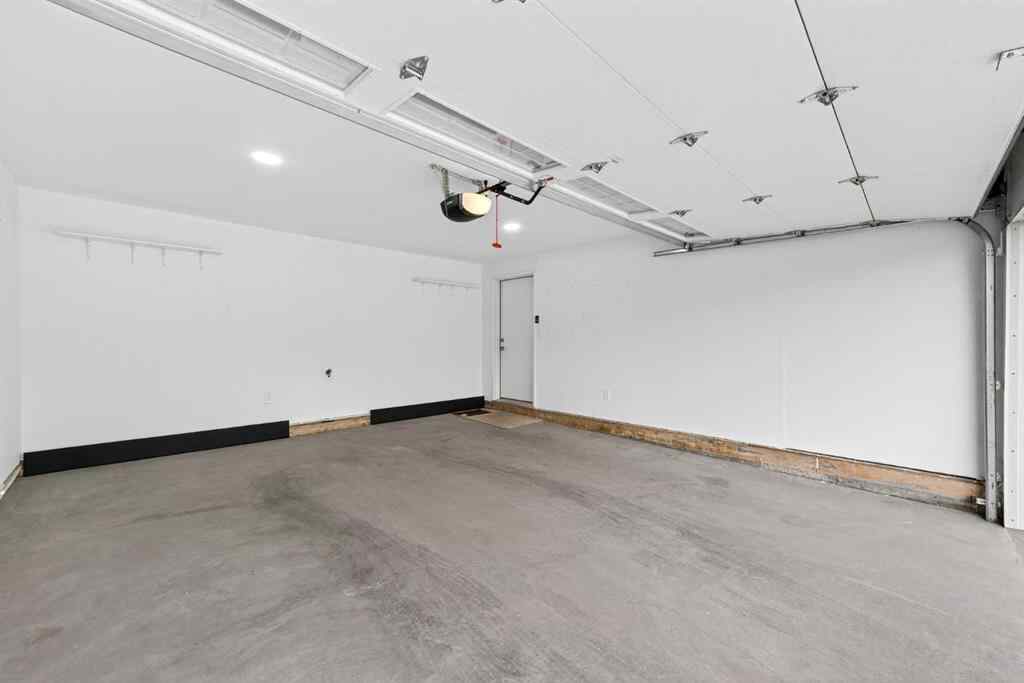 MLS® A2253921 - 405 Wentworth Row SW in West Springs Calgary, Residential