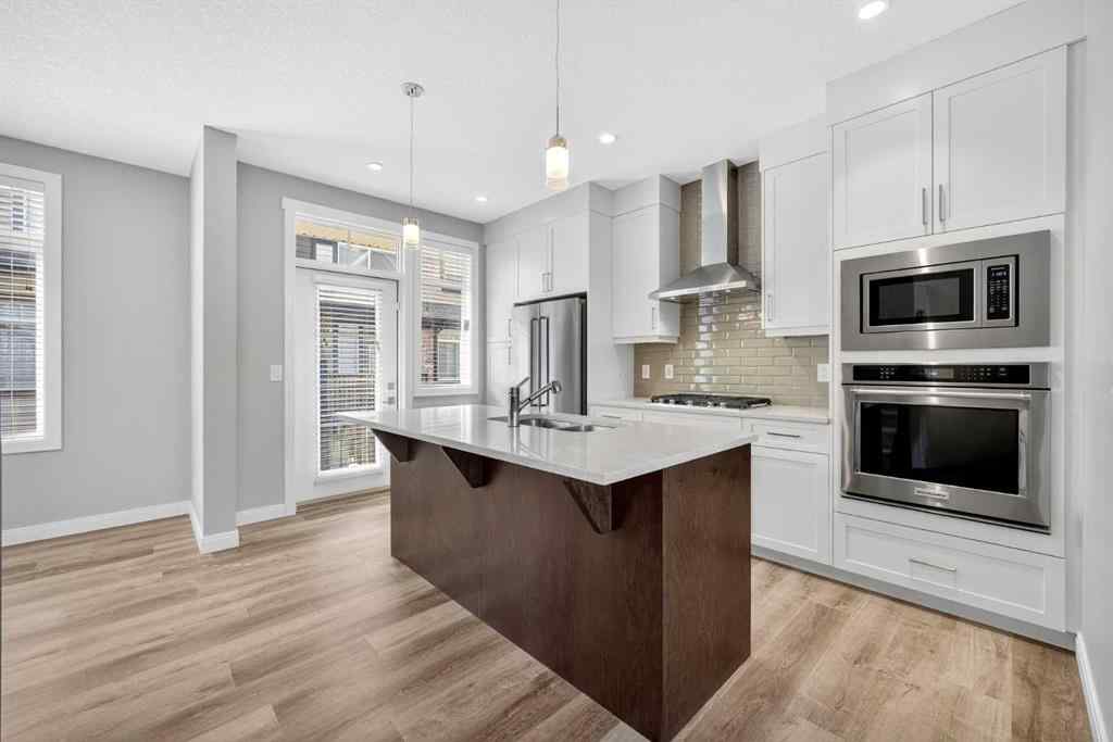 MLS® A2253921 - 405 Wentworth Row SW in West Springs Calgary, Residential