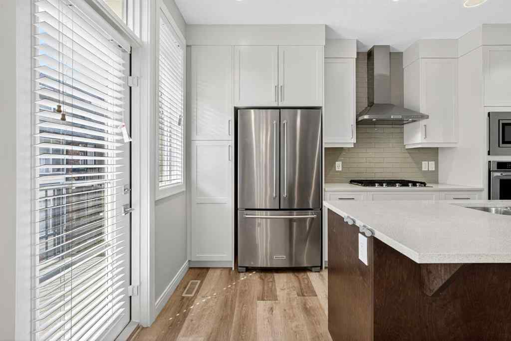 MLS® A2253921 - 405 Wentworth Row SW in West Springs Calgary, Residential