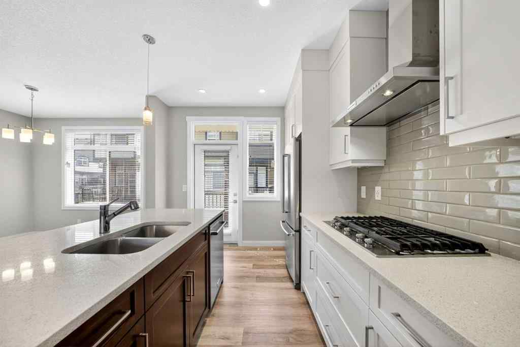 MLS® A2253921 - 405 Wentworth Row SW in West Springs Calgary, Residential