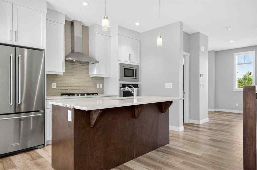 MLS® A2253921 - 405 Wentworth Row SW in West Springs Calgary, Residential