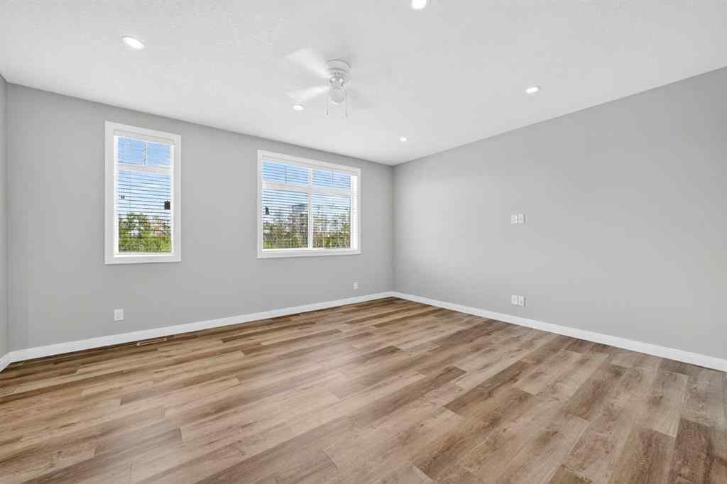 MLS® A2253921 - 405 Wentworth Row SW in West Springs Calgary, Residential