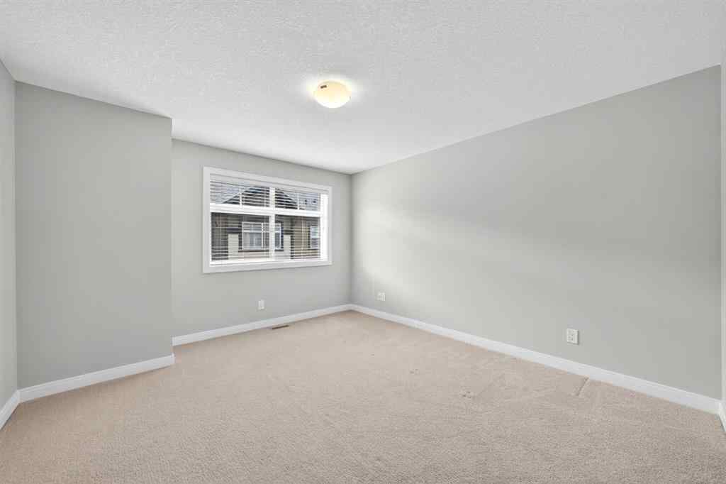 MLS® A2253921 - 405 Wentworth Row SW in West Springs Calgary, Residential
