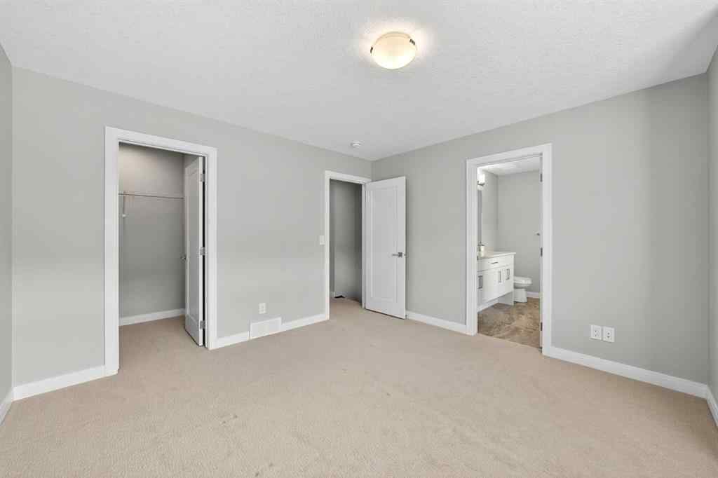 MLS® A2253921 - 405 Wentworth Row SW in West Springs Calgary, Residential