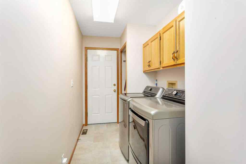 MLS® A2253927 - 21 Dunn Close  in Deer Park Village Red Deer, Residential