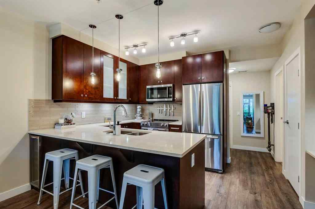 MLS® A2253928 - Unit #106 1720 10 Street SW in Lower Mount Royal Calgary, Residential