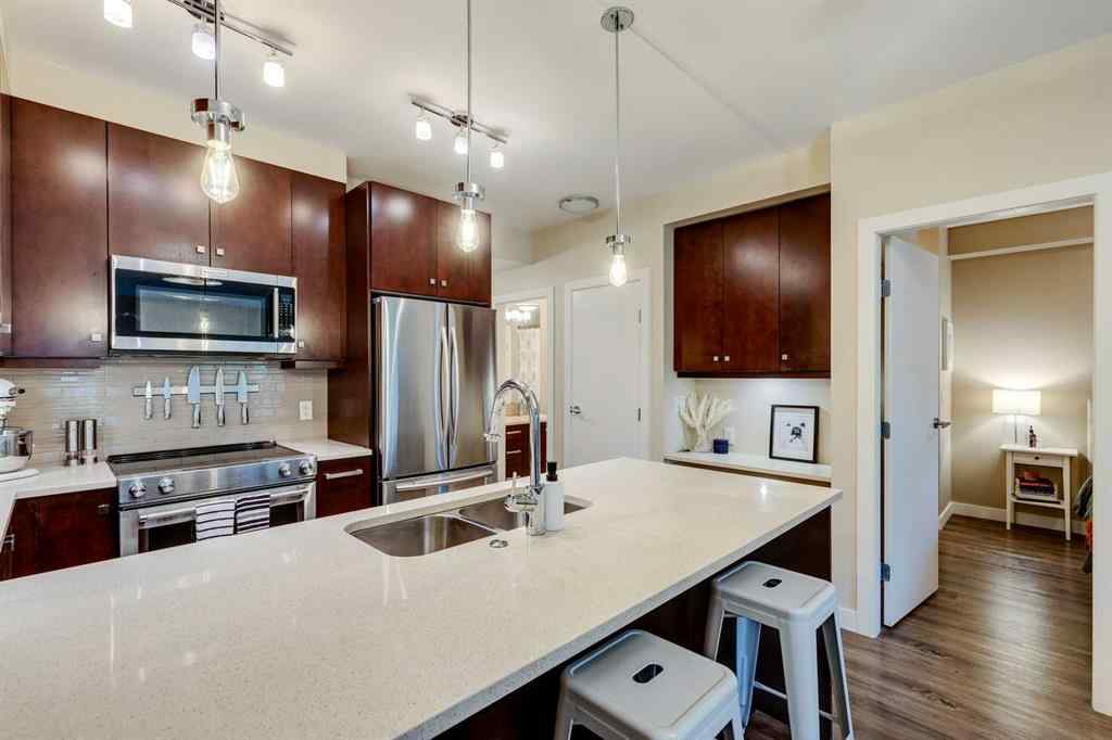 MLS® A2253928 - Unit #106 1720 10 Street SW in Lower Mount Royal Calgary, Residential