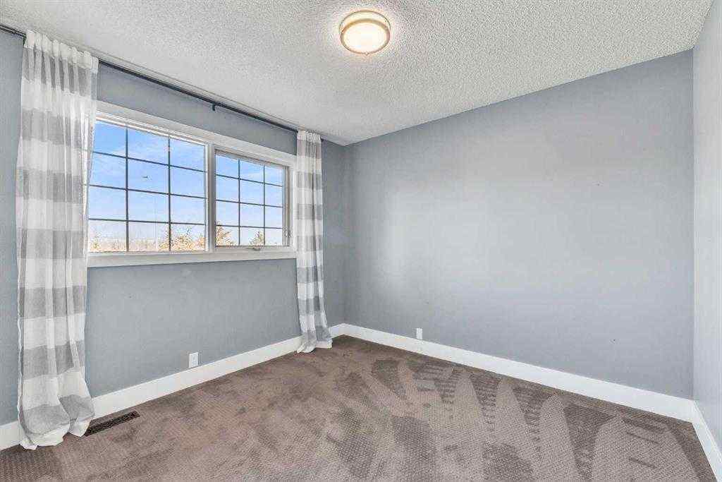 MLS® A2253930 - 129 Edgebrook Gardens NW in Edgemont Calgary, Residential