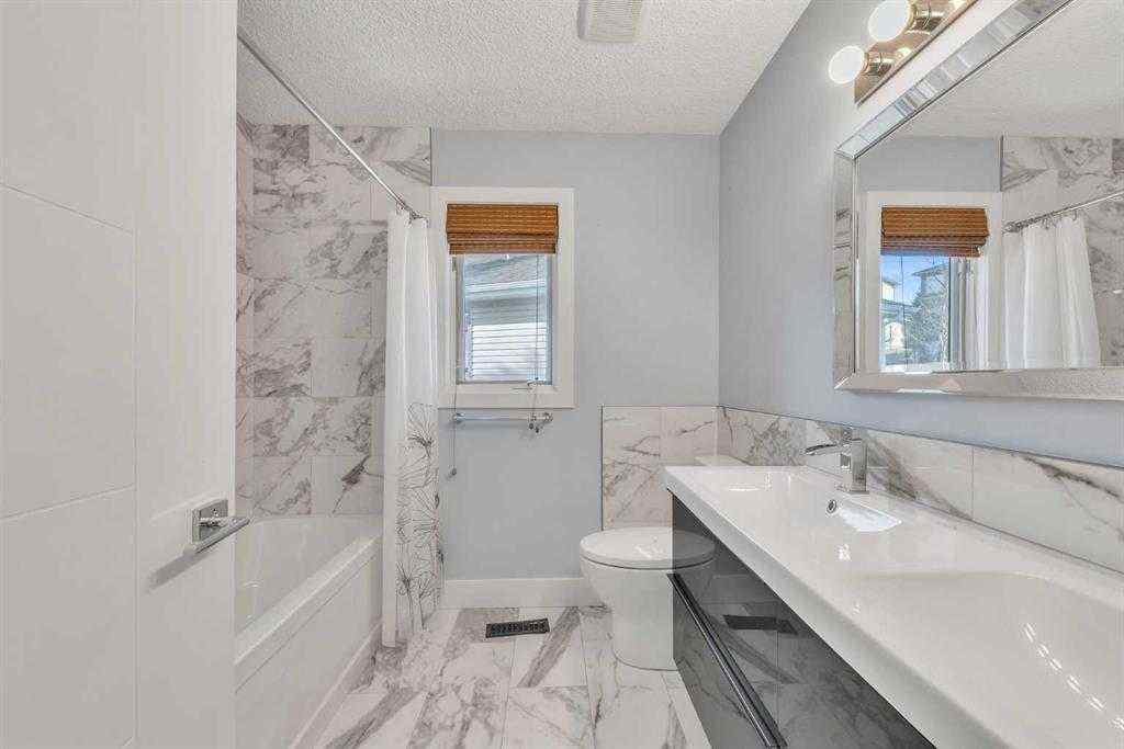 MLS® A2253930 - 129 Edgebrook Gardens NW in Edgemont Calgary, Residential