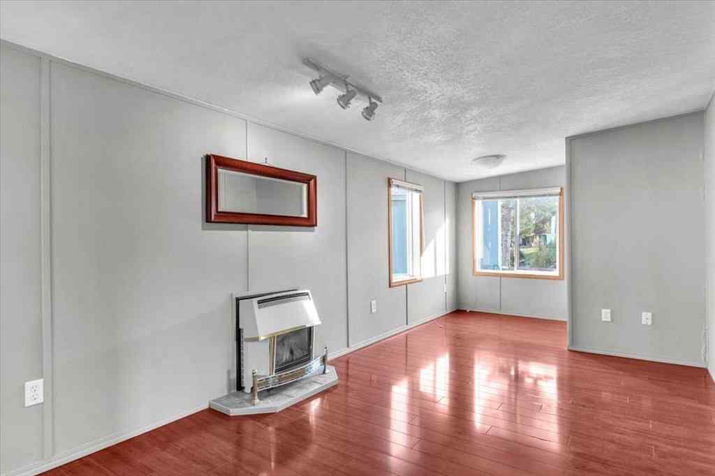 MLS® A2253934 - 294 Burroughs Circle NE in Montgomery Calgary, Mobile