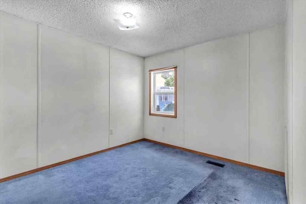 MLS® A2253934 - 294 Burroughs Circle NE in Montgomery Calgary, Mobile