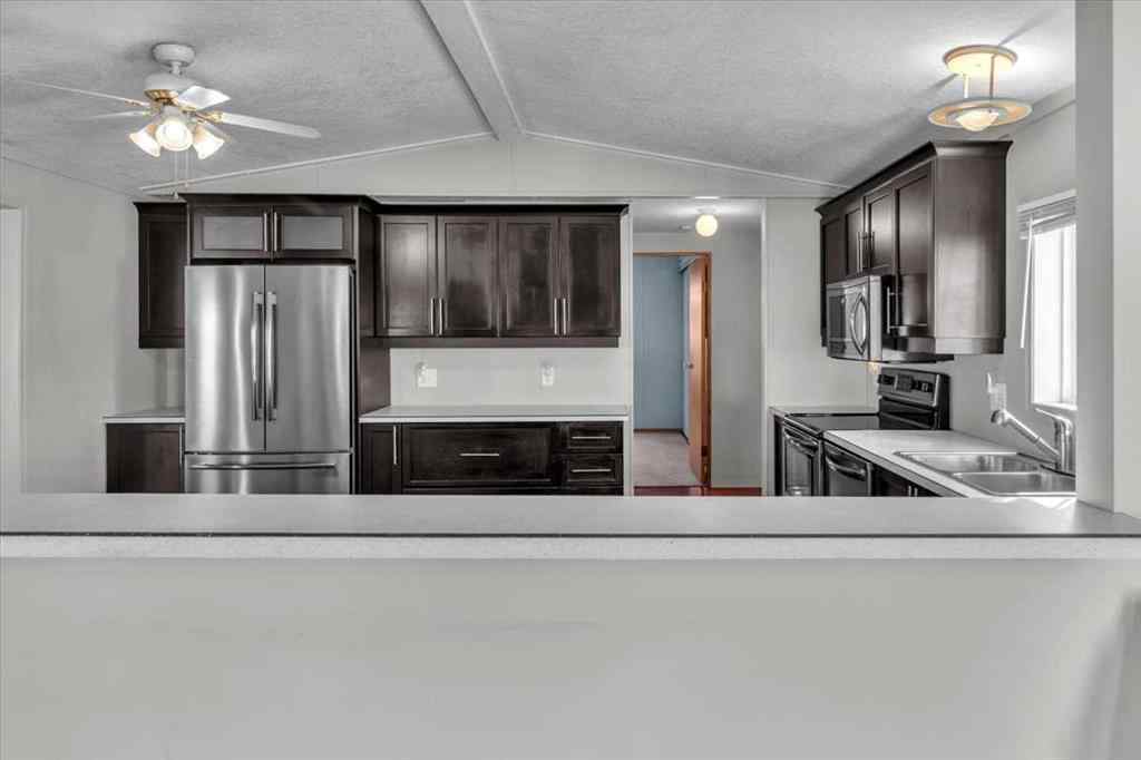 MLS® A2253934 - 294 Burroughs Circle NE in Montgomery Calgary, Mobile