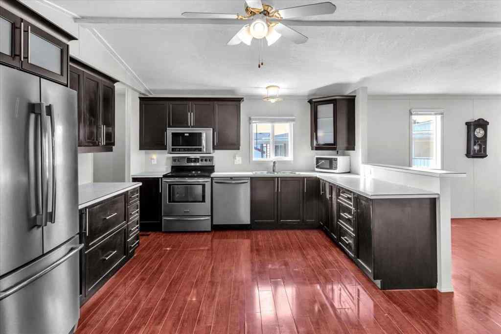MLS® A2253934 - 294 Burroughs Circle NE in Montgomery Calgary, Mobile