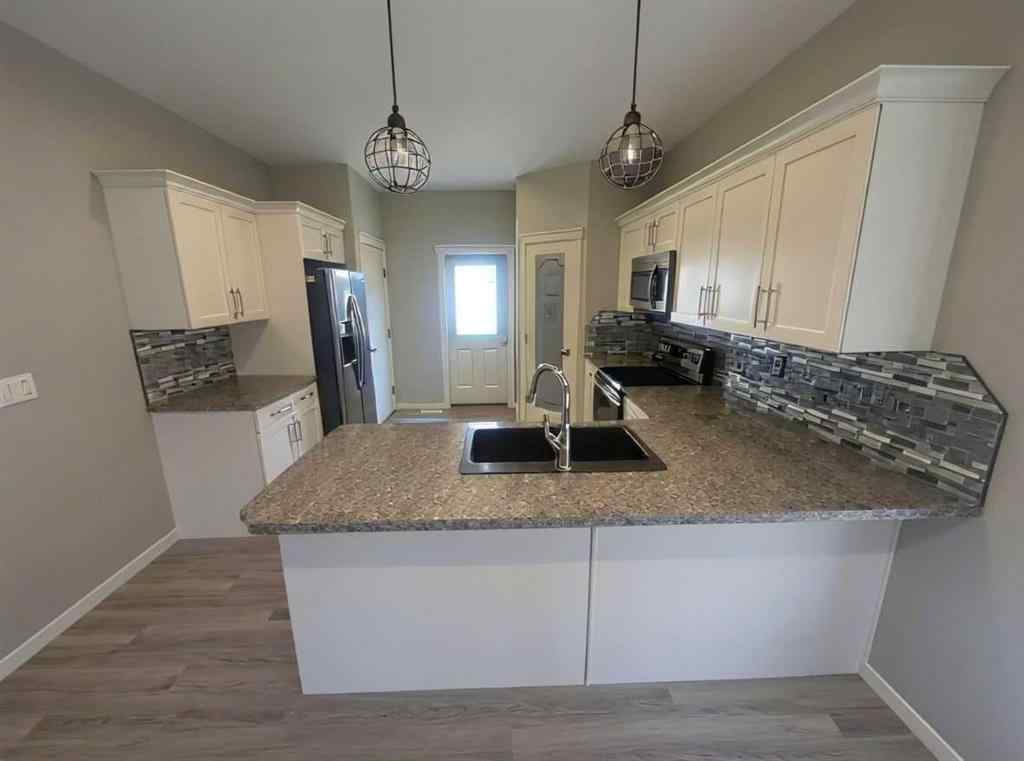 MLS® A2253944 - 115 Aurora Heights  in Aurora Blackfalds, Residential