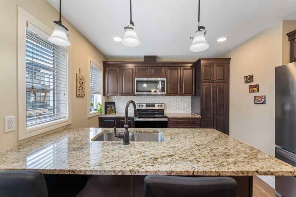 MLS® A2253979 - 572 Savanna Boulevard NE in Saddle Ridge Calgary, Residential