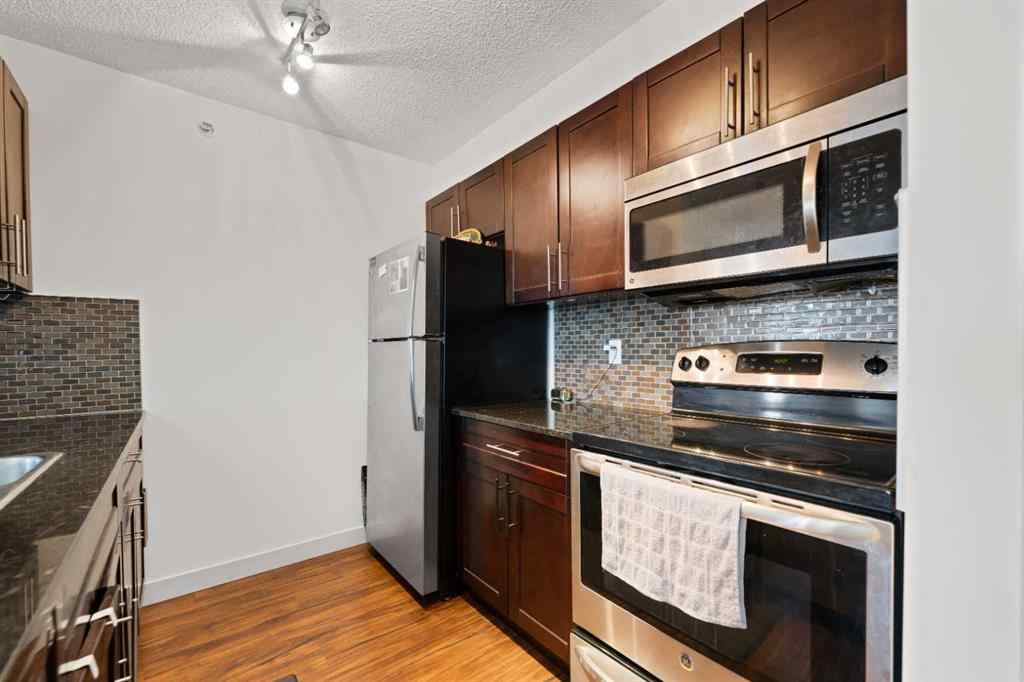 MLS® A2253990 - Unit #411 15 Saddlestone Way NE in Saddle Ridge Calgary, Residential