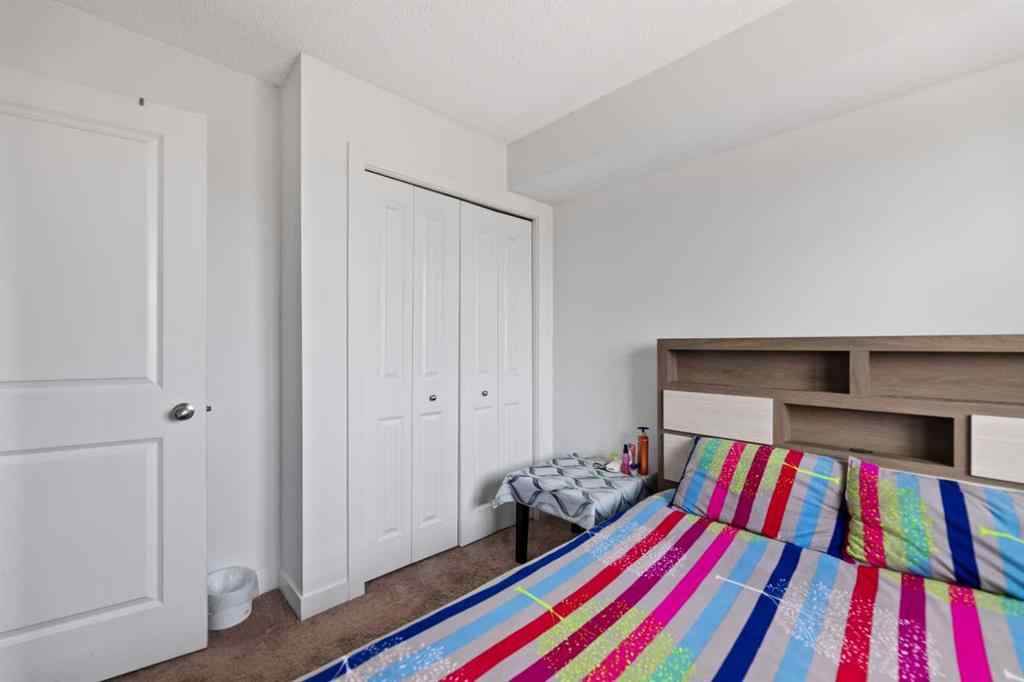 MLS® A2253990 - Unit #411 15 Saddlestone Way NE in Saddle Ridge Calgary, Residential