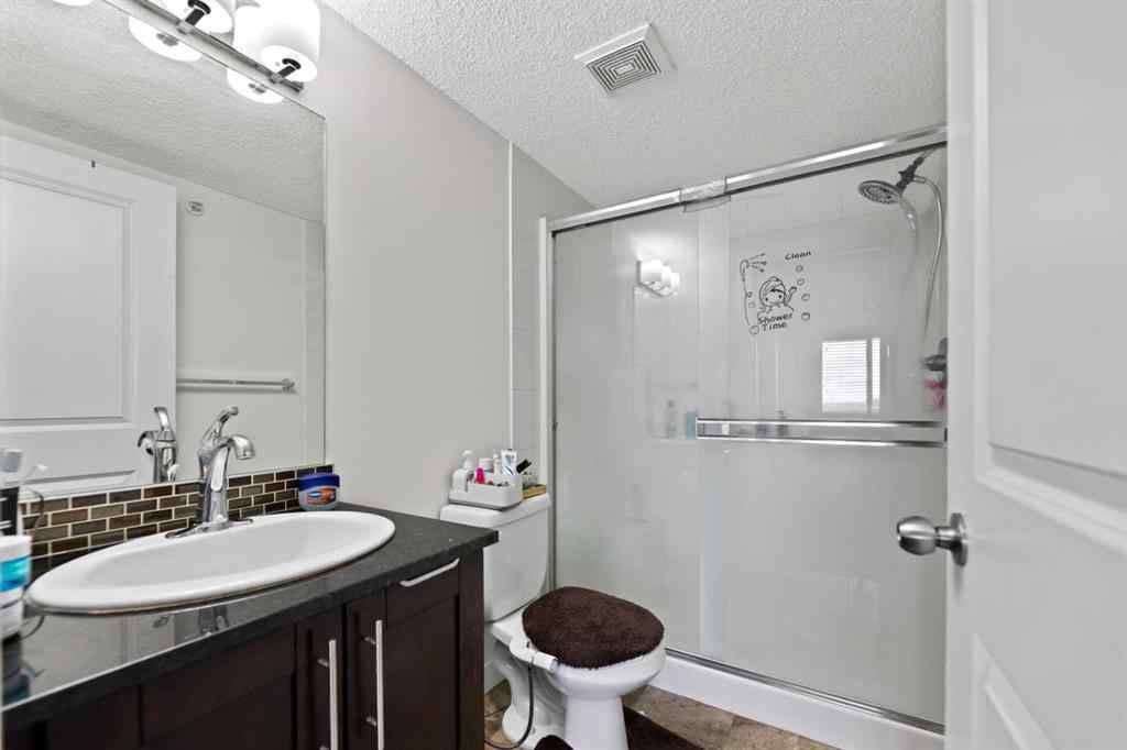 MLS® A2253990 - Unit #411 15 Saddlestone Way NE in Saddle Ridge Calgary, Residential