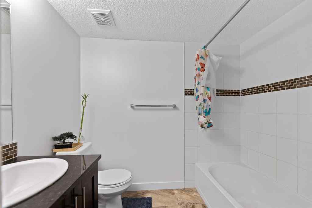 MLS® A2253990 - Unit #411 15 Saddlestone Way NE in Saddle Ridge Calgary, Residential