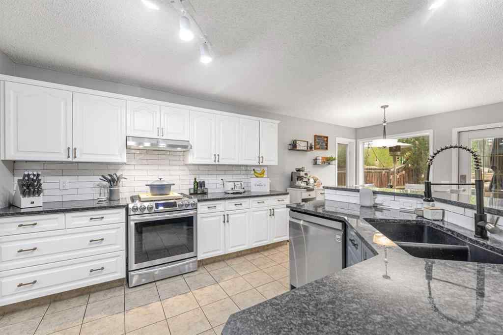 MLS® A2254025 - 86 Tuscany Ridge View NW in Tuscany Calgary, Residential