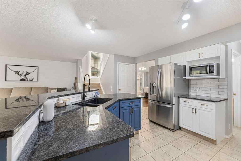 MLS® A2254025 - 86 Tuscany Ridge View NW in Tuscany Calgary, Residential