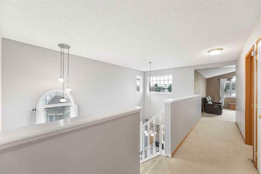 MLS® A2254025 - 86 Tuscany Ridge View NW in Tuscany Calgary, Residential