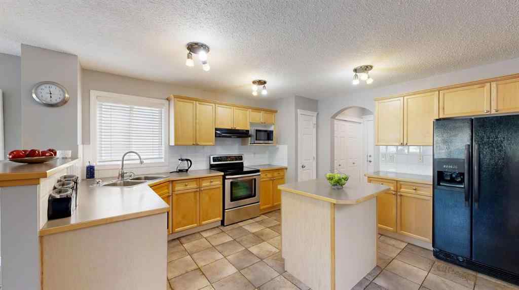 MLS® A2254078 - 70 Crystalridge Close  in Crystalridge Okotoks, Residential