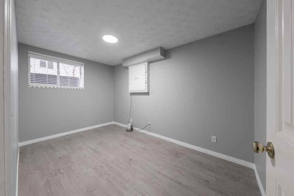 MLS® A2254095 - 8007 Laguna Way NE in Monterey Park Calgary, Residential