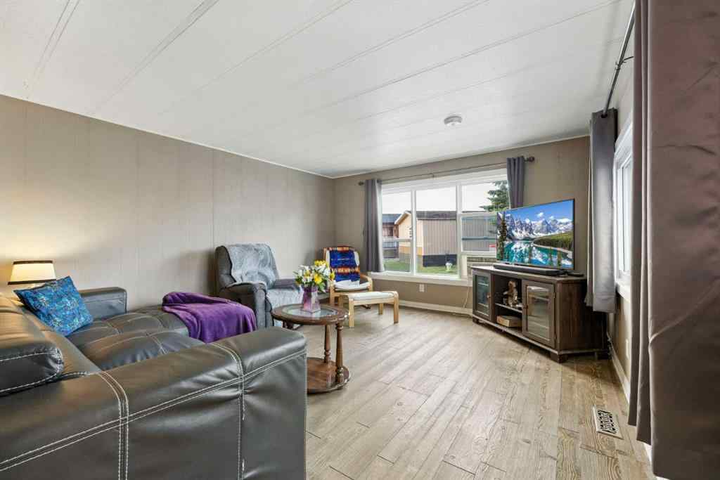 MLS® A2254118 - 109 Sunset Way NE in North Central High River High River, Mobile
