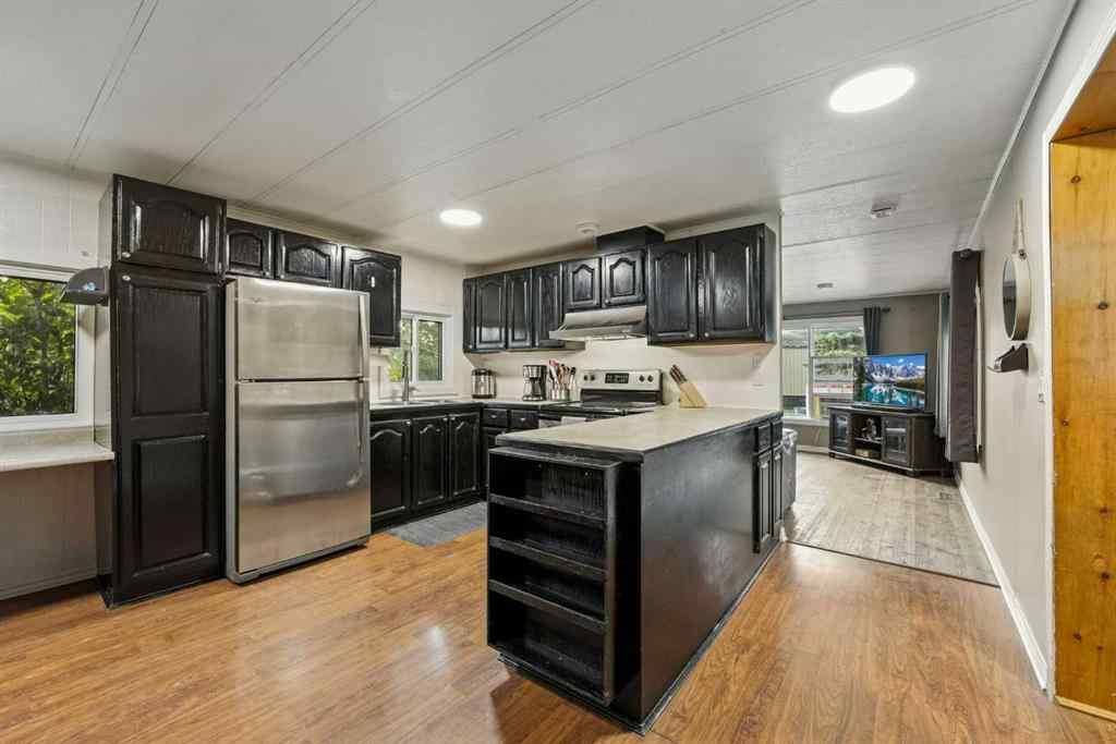 MLS® A2254118 - 109 Sunset Way NE in North Central High River High River, Mobile