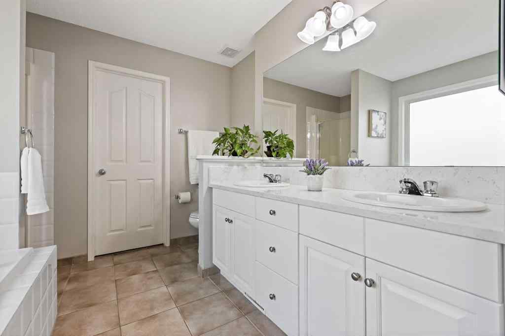 MLS® A2254156 - 125 Everwillow Close SW in Evergreen Calgary, Residential