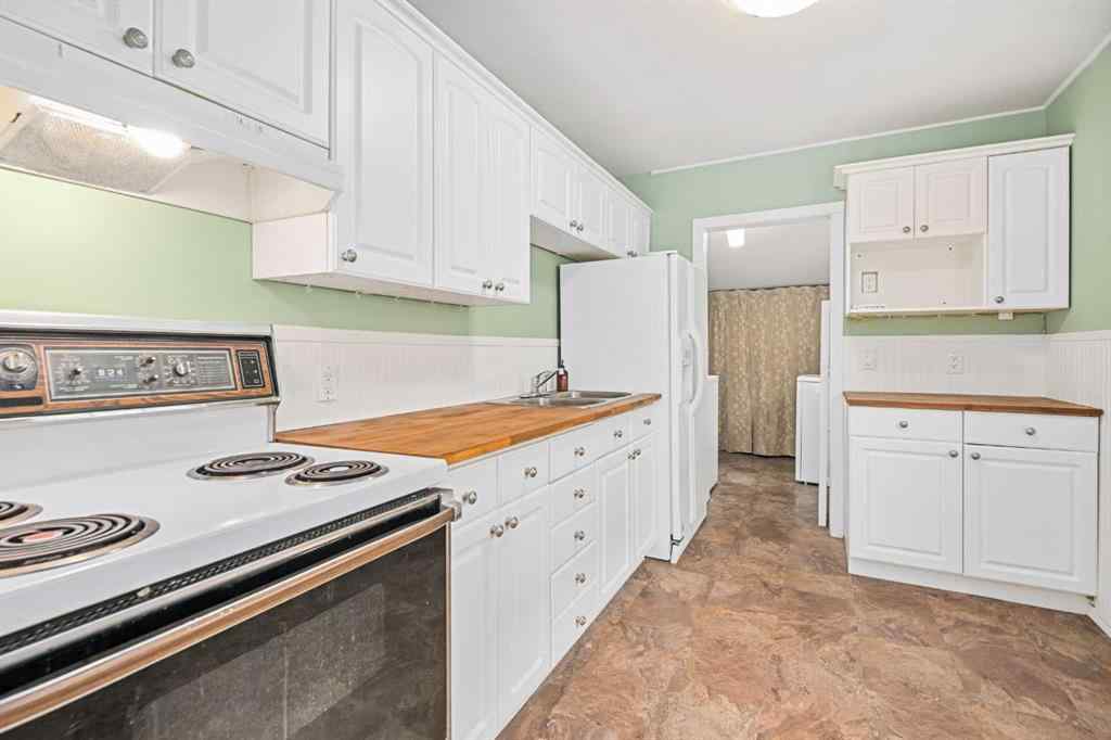 MLS® A2254157 - 605 19 Street NW in West Hillhurst Calgary, Residential