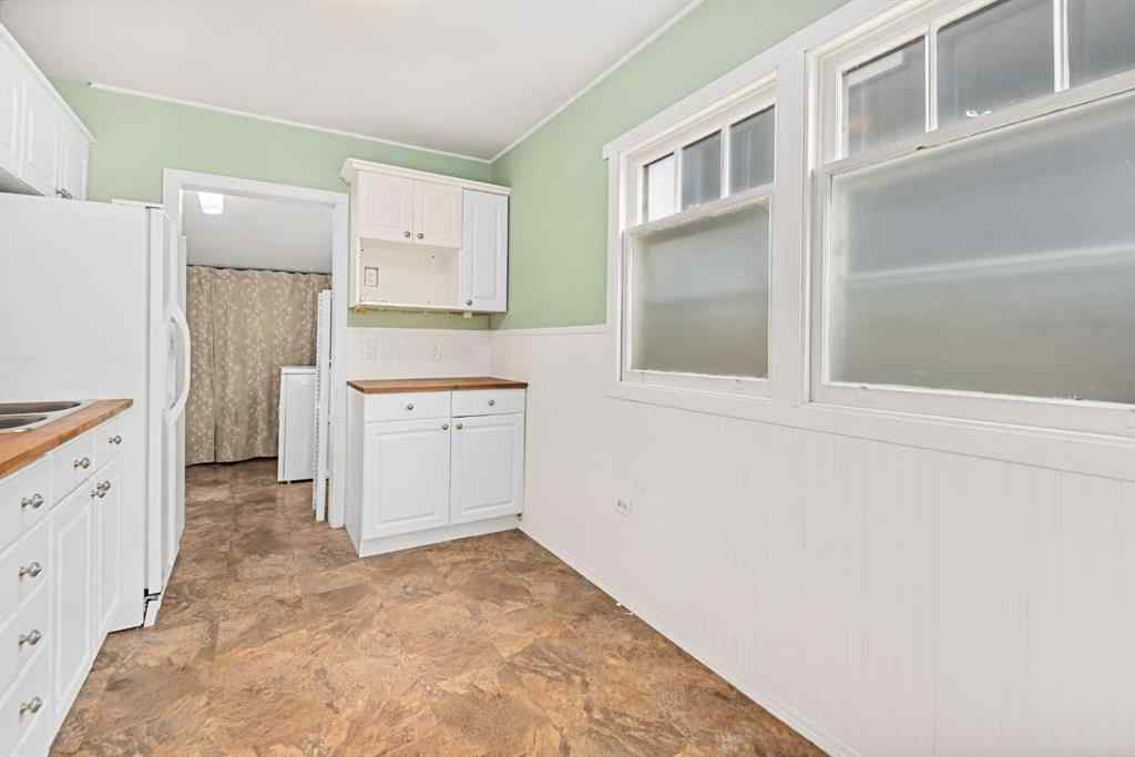 MLS® A2254157 - 605 19 Street NW in West Hillhurst Calgary, Residential