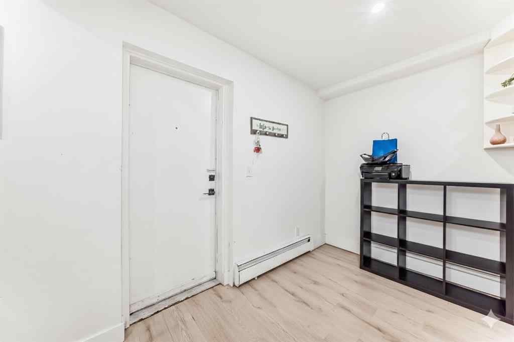 MLS® A2254158 - Unit #101 1113 37 Street SW in Rosscarrock Calgary, Residential