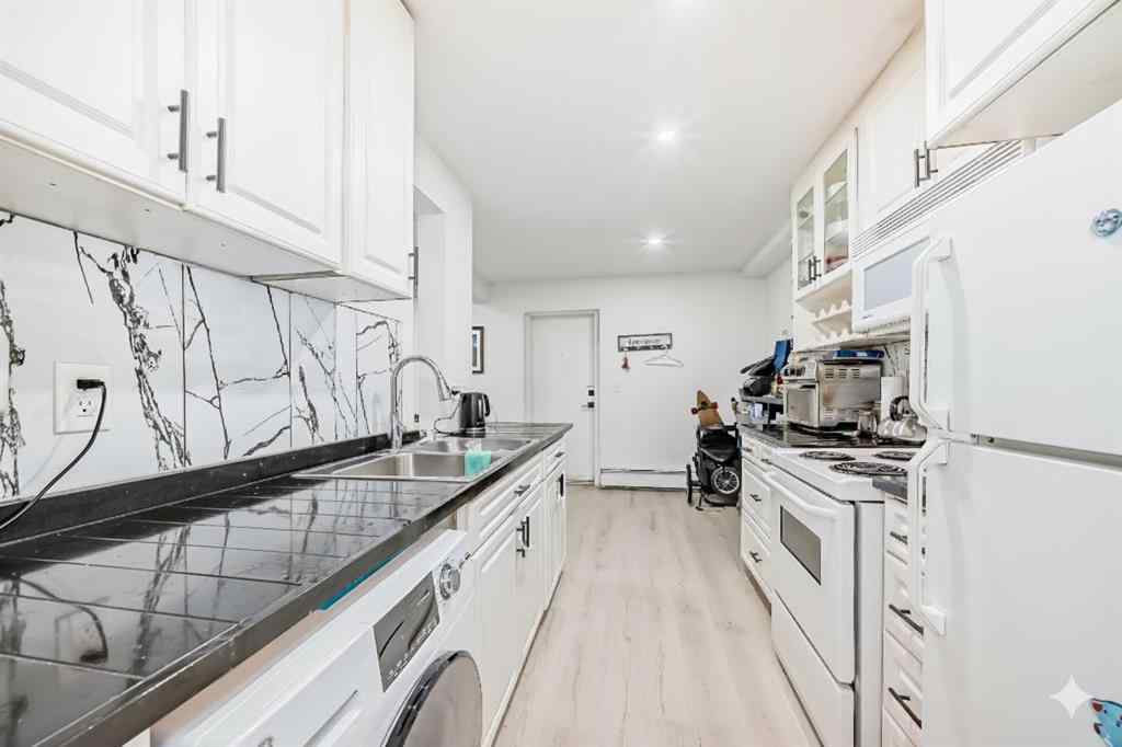 MLS® A2254158 - Unit #101 1113 37 Street SW in Rosscarrock Calgary, Residential
