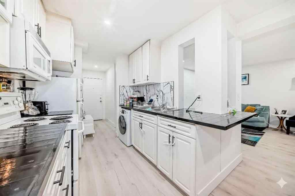 MLS® A2254158 - Unit #101 1113 37 Street SW in Rosscarrock Calgary, Residential