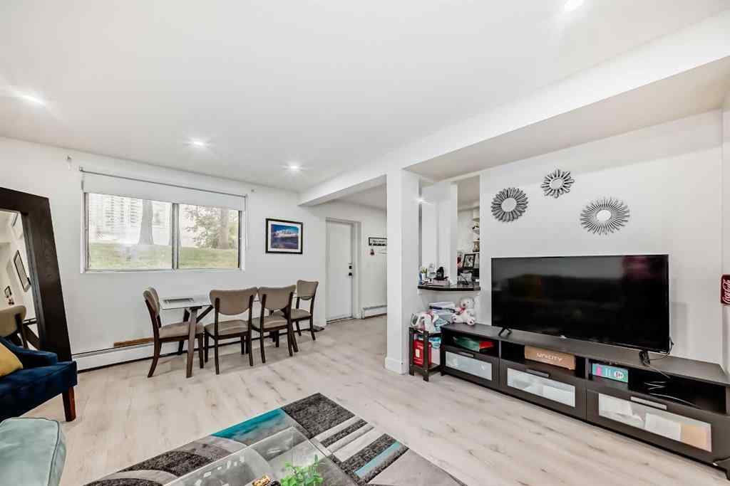 MLS® A2254158 - Unit #101 1113 37 Street SW in Rosscarrock Calgary, Residential