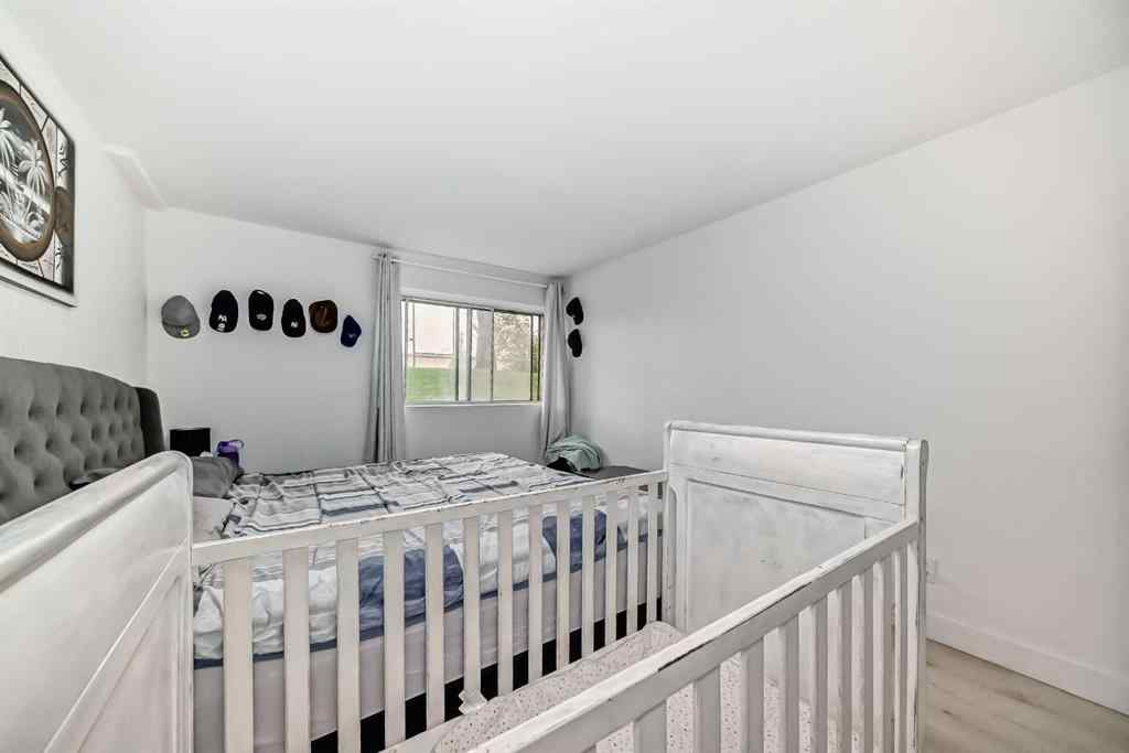 MLS® A2254158 - Unit #101 1113 37 Street SW in Rosscarrock Calgary, Residential
