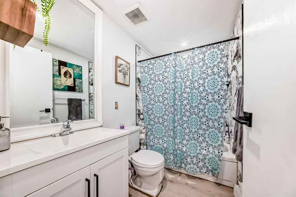 MLS® A2254158 - Unit #101 1113 37 Street SW in Rosscarrock Calgary, Residential