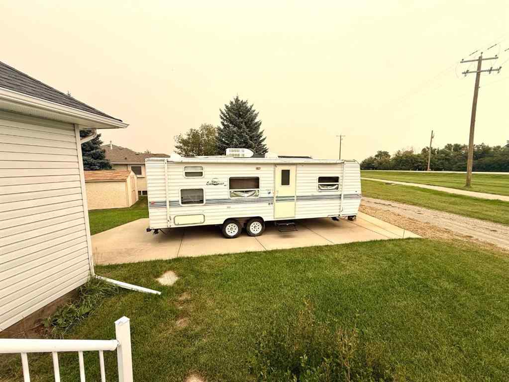 MLS® A2254180 - 405 Slade Place  in NONE Nanton, Residential