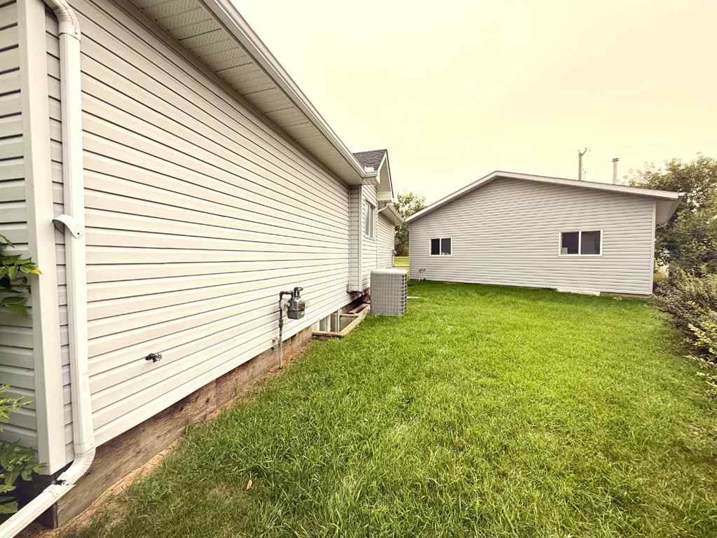 MLS® A2254180 - 405 Slade Place  in NONE Nanton, Residential