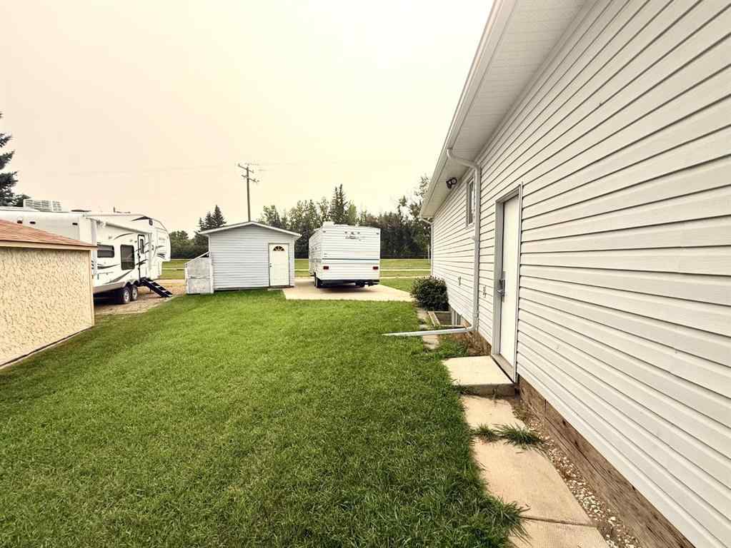 MLS® A2254180 - 405 Slade Place  in NONE Nanton, Residential