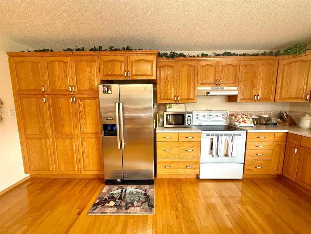 MLS® A2254180 - 405 Slade Place  in NONE Nanton, Residential