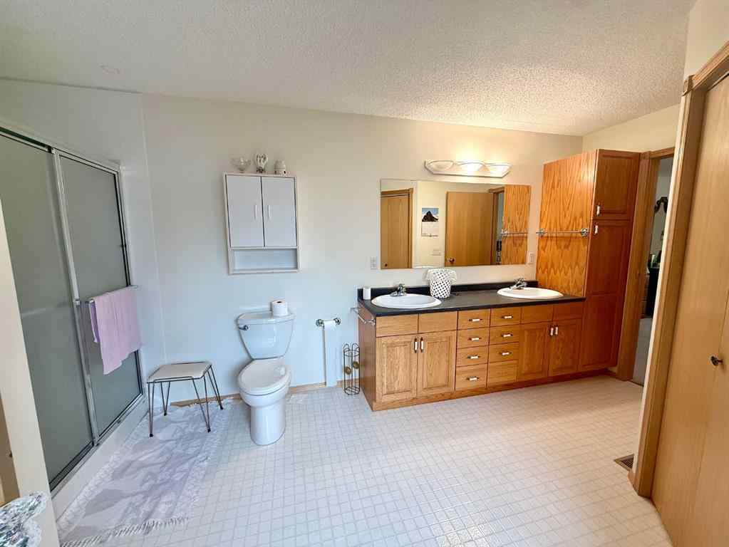 MLS® A2254180 - 405 Slade Place  in NONE Nanton, Residential
