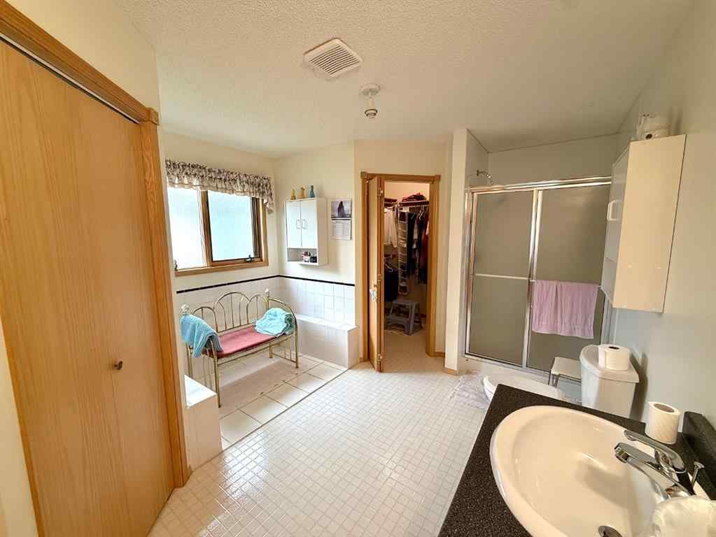 MLS® A2254180 - 405 Slade Place  in NONE Nanton, Residential